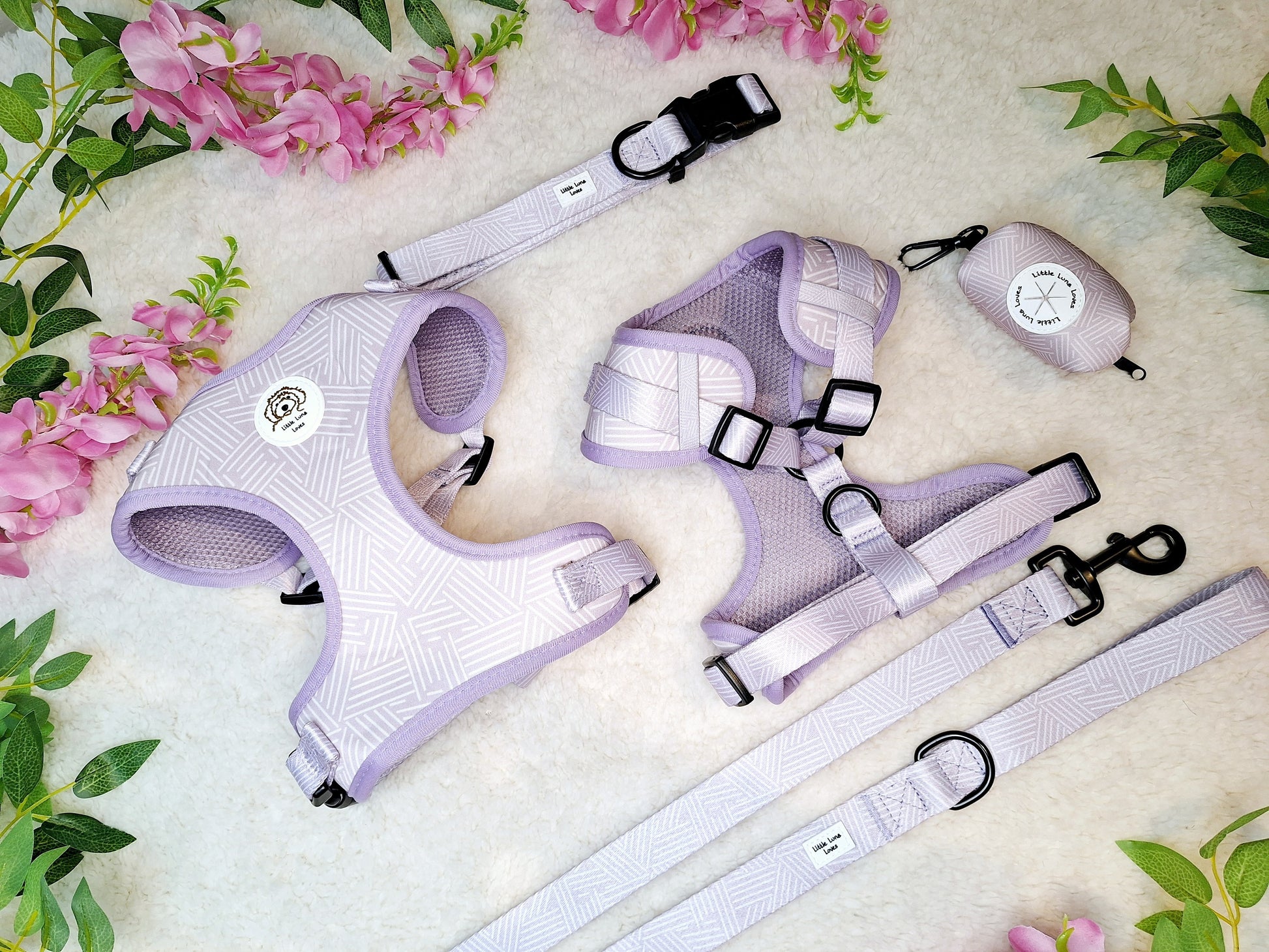 Adjustable purple dog harness with matching collar, lead and poop bag holder