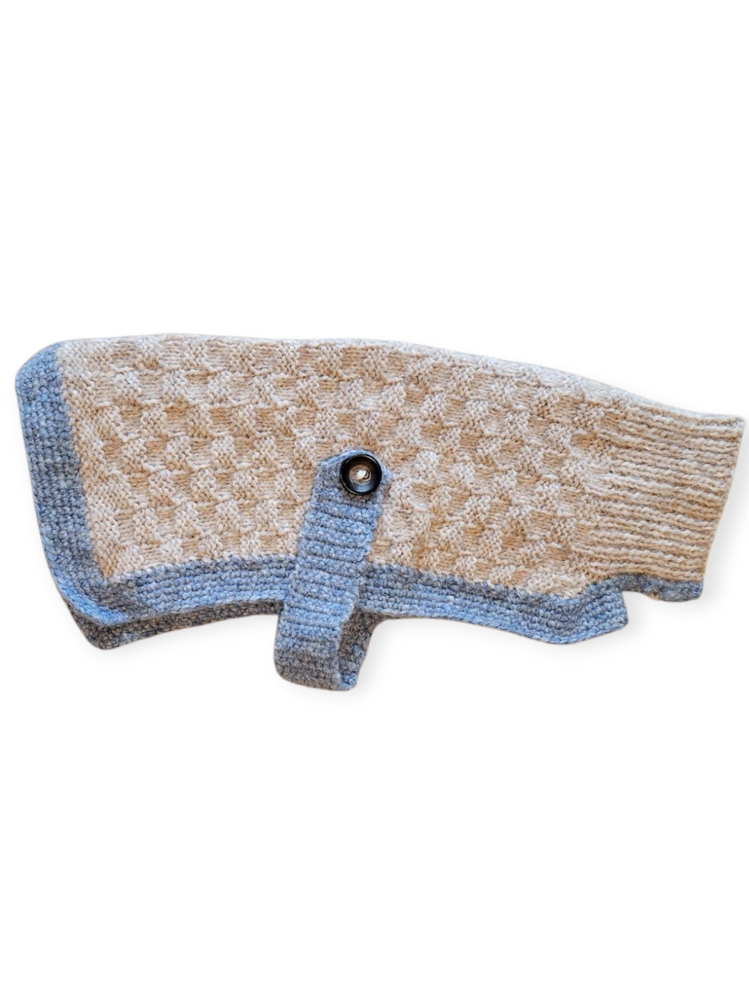 A cream-colored dog jumper with blue edges, hand knitted, displayed on a neutral background.