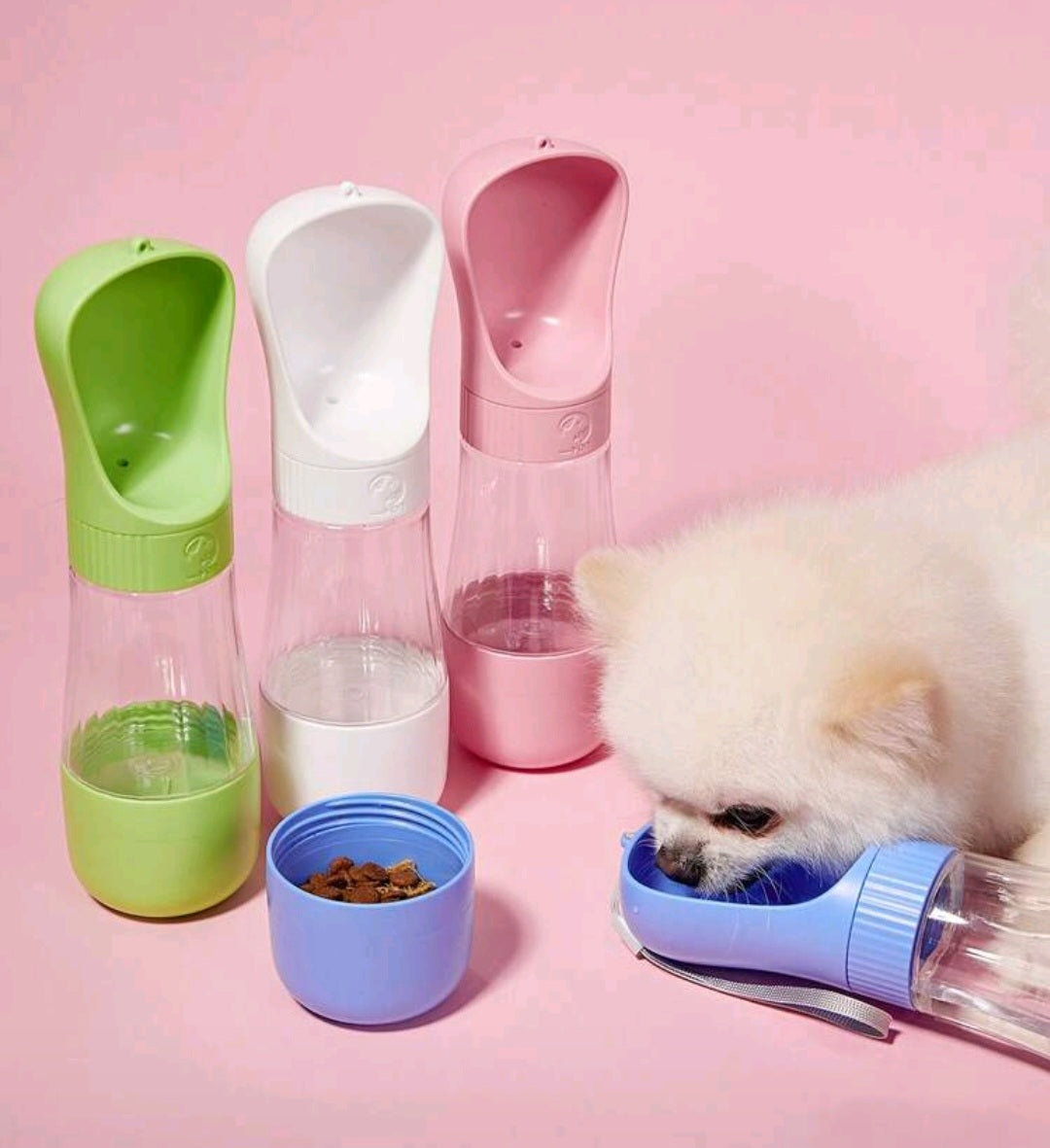 Pet water bottle and food container set with a small dog on a pink background