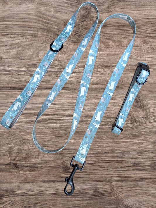 Dog leash with rabbits pattern on a wooden surface