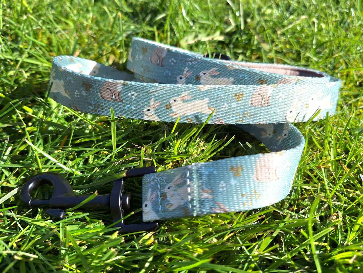 Dog leash with rabbit pattern on grass
